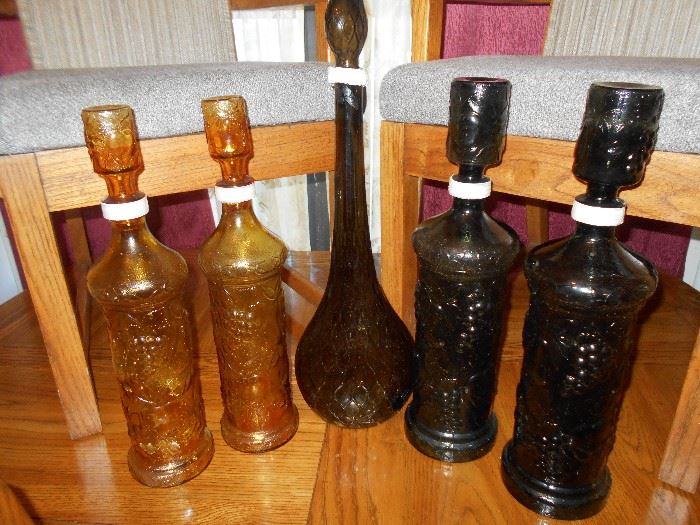 Italian glass decanters, lids taped to avoid damage