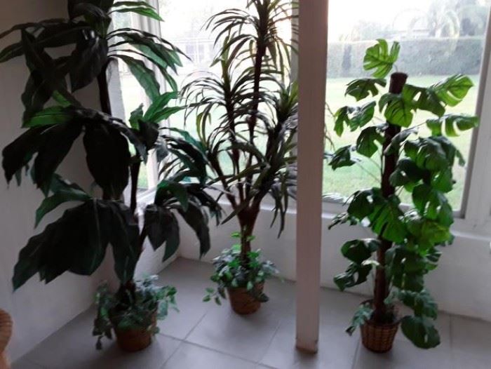 3 large artificial plants in baskets
