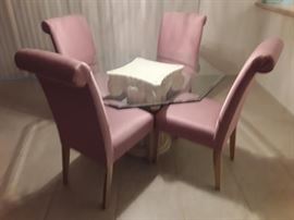 Glass table with pedestal