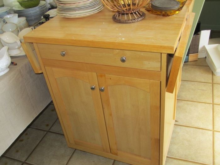 one of a pair of rolling kitchen cabinets