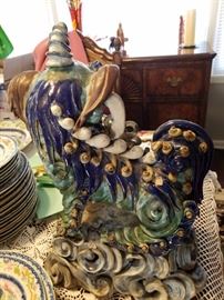 Rear view of rare antique unicorn foo dog with baby roof tile