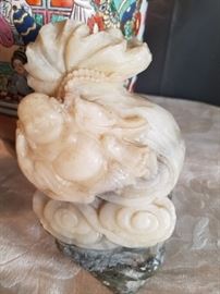 Beautiful soapstone Buddha on base
