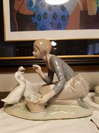 Lladro girl feeding ducks