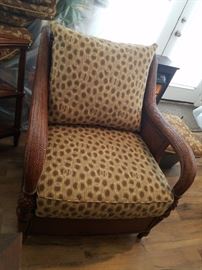 One of two rattan chairs