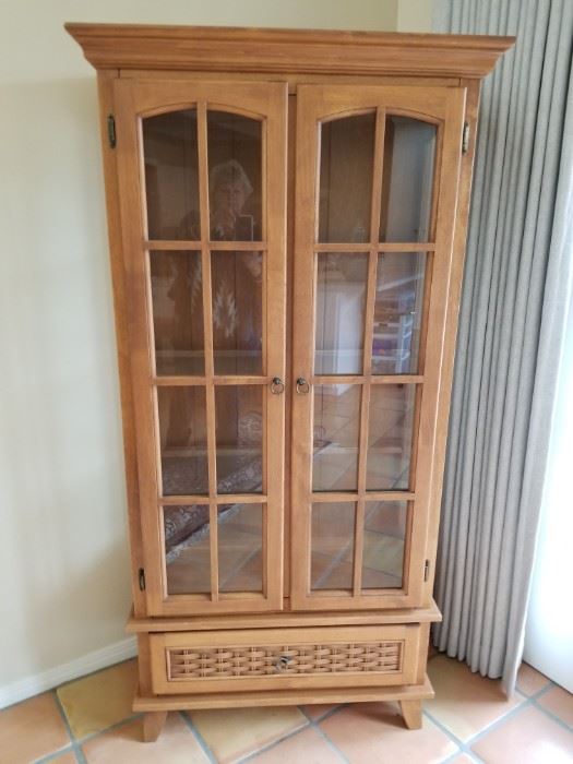 Lighted, wood display cabinet with glass shelves