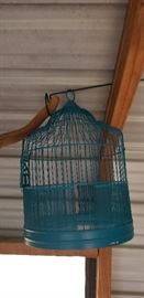 Several vintage bird cages