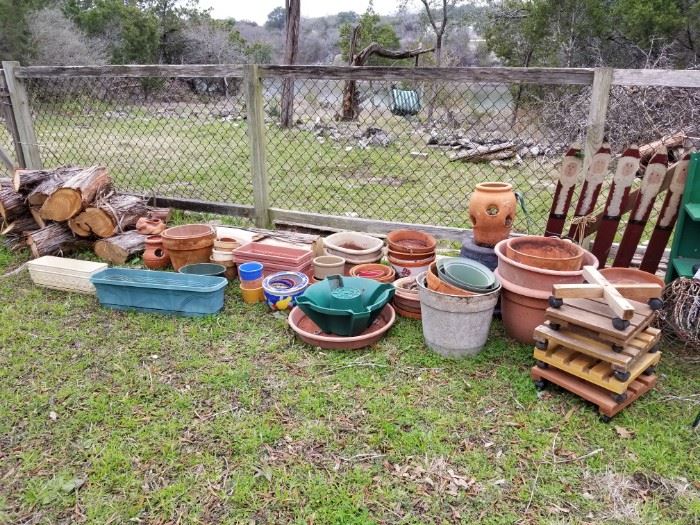 Lots of pots , birdhouses and outdoor items