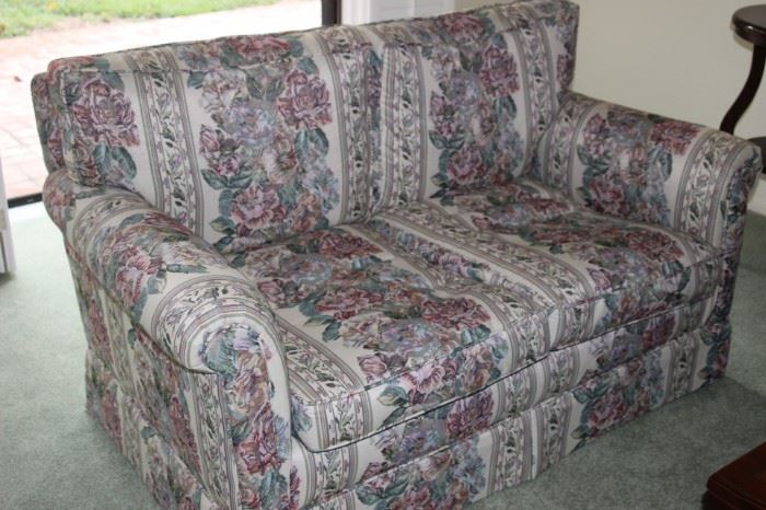 Floral love seat.