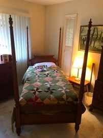 Twin antique four-poster bed, hand sewn antique quilt