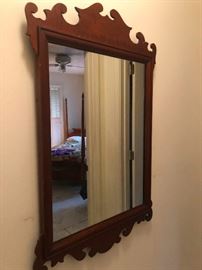 ornate wood framed hall mirror