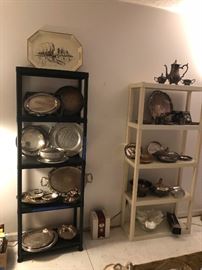 plenty of silver plated servers and trays
