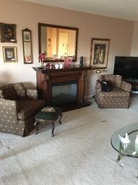 Beautiful electric fireplace. New a few years ago for $1800. Will sell for $600 or b/o. Gorgeous mantle and wood. Remote. 