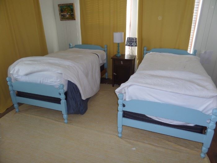 matching twin beds (like new mattresses)