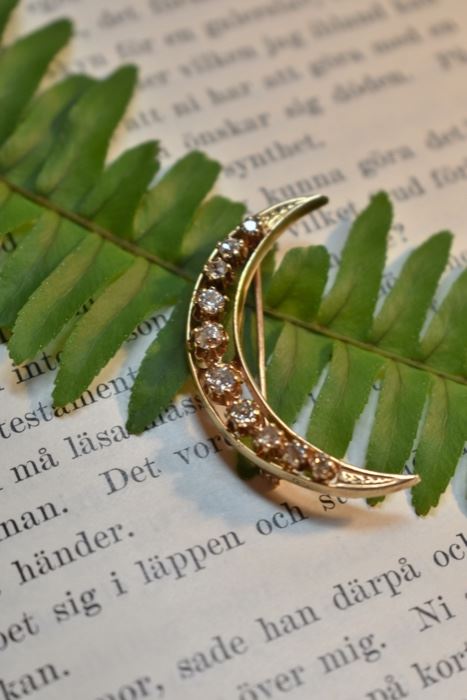 14k crescent brooch with diamonds