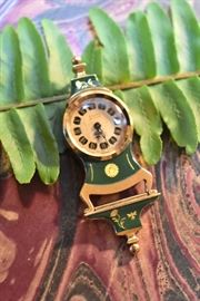 Adler's timepiece charm