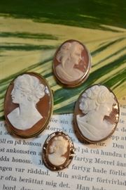 Antique gold plated and one sterling cameo brooches 