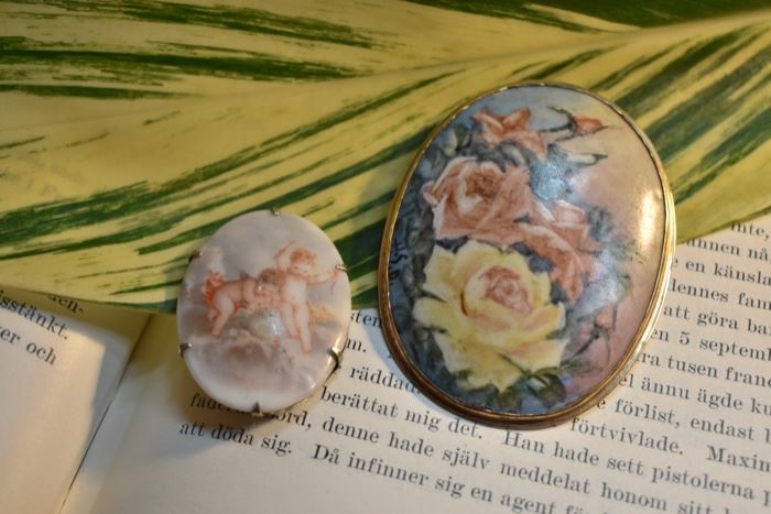 Hand painted brooches - the smaller is Limoges