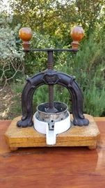 A rare antique French fruit press. $250