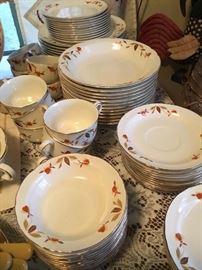 12 piece setting with tea pot, butter dish, salt and pepper, sugar creamer and more!