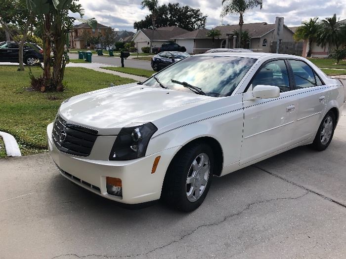 2004 Cadillac CTS with under 30,000. Owned by a little old lady.