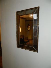 One of pair of antique mirrors