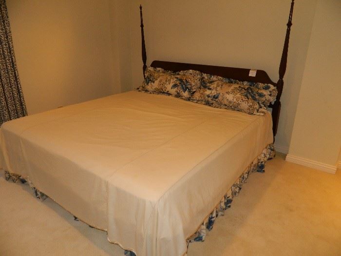 King size bed with headboard.