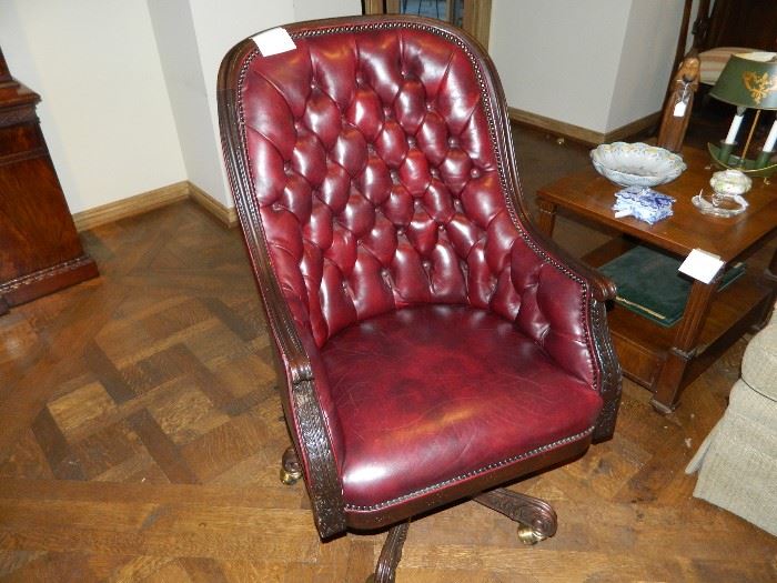Button tufted leather office chair.