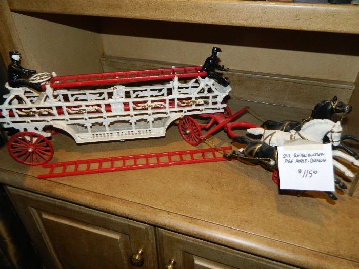 Reproduction fire horse and wagon set.
