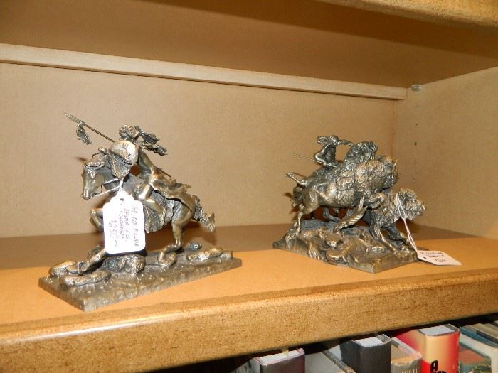 Pair of cast figurines.