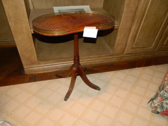 Small kidney-shaped side table.