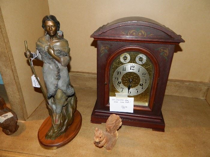 Bronze by Juan Dell.  Clock