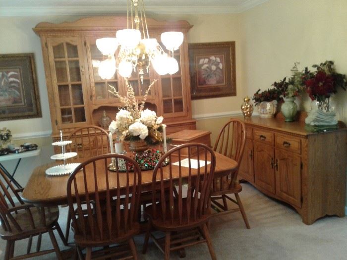 Amish oak dining room set wow!  Table, chairs, drop down leaf I think?, will check.  China, buffet, hutch in other room, too.