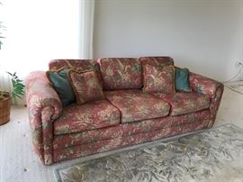 This is an older couch but super comfy and excellent construction with no tears or marks.