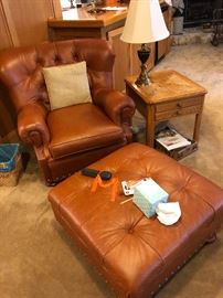 Brown leather chair.  Ottoman
