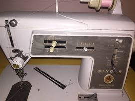 Singer zig zag sewing machine with nice cabinet