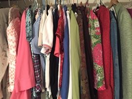 large closet filled with very nice larger sized women's clothing