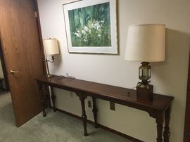 Foyer table - Very unique as it is a slim line and longer than most.  Excellent condition,
