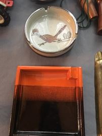 Mid century modern ash tray (orange) and is marked Italy.  