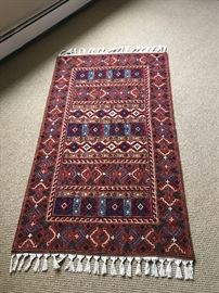 Tapestry rug with tribal motif 