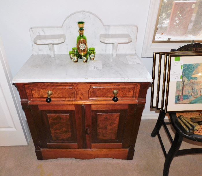 Victorian marble top wash stand with teardrop pulls.