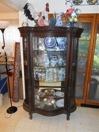ornate curio cabinet
