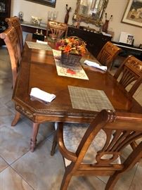 HERE ARE A FEW PHOTOS                                       BEAUTIFUL ORNATE CARVED DINING TABLE WITH CHAIRS