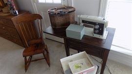 Kenmore sewing machine and antique sewing rocker