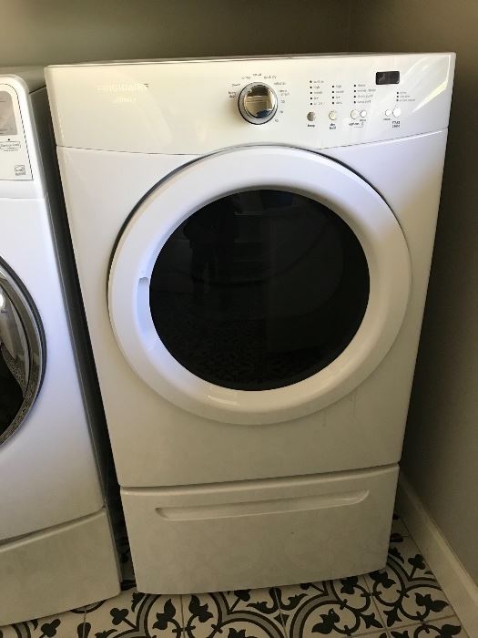 Electric washer & Dryer like new both on pedestals.