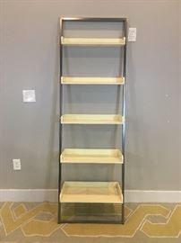 Leaning Yellow Shelves & Metal Bookcase