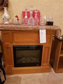 Electric fireplace with oak mantle and hearth 