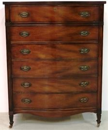 Bow front mahogany chest by Dixie