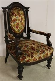 Ornately carved gentleman's chair