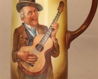 Tankard with musician