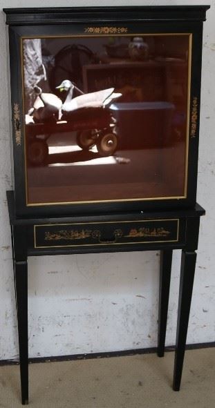 Ebonized curio cabinet